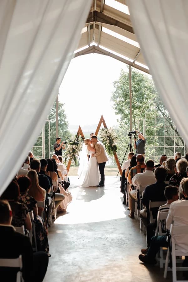 Open Air Chapel aisle with natural greenery at Riverside Country Estate
