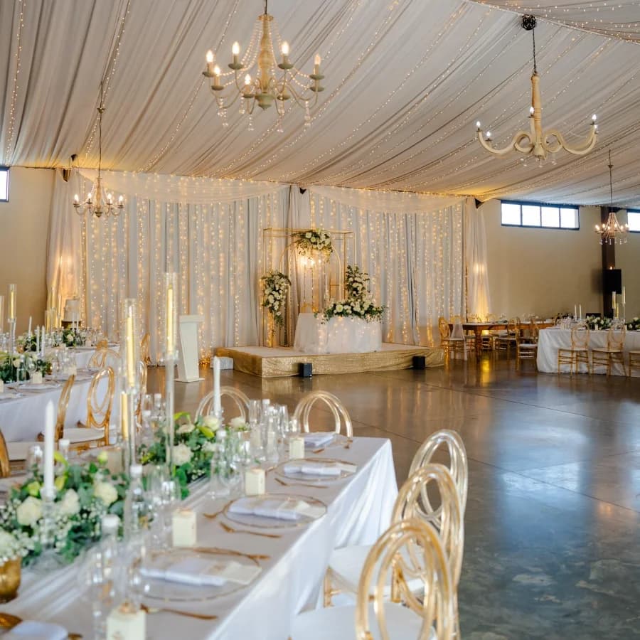 Wisteria Hall wedding setup with dramatic ceiling and dance floor